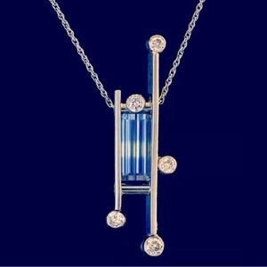 Bi-color sapphire with diamonds. Designed by Kyle Campbell, Charleston, SC.